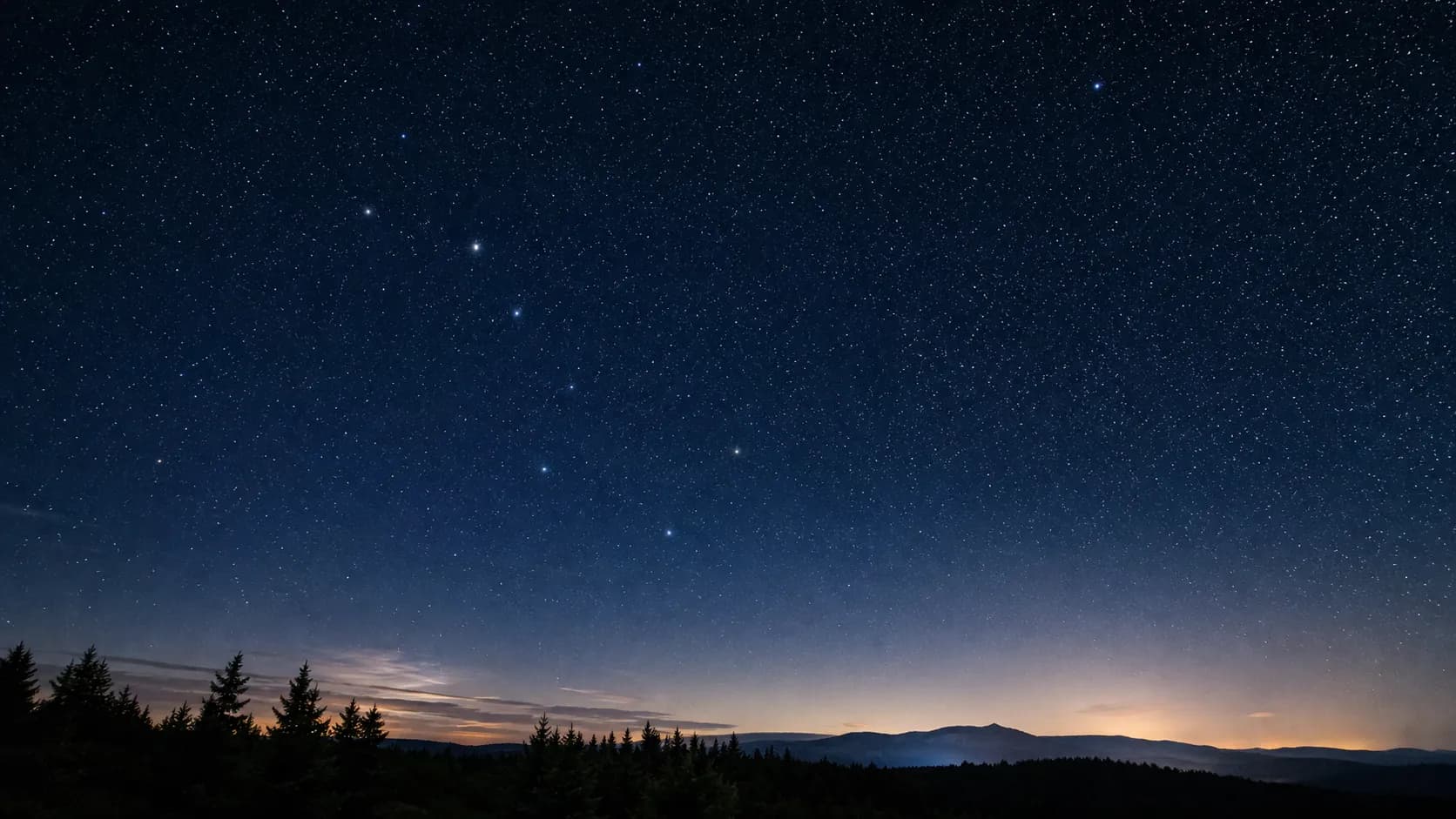 北の夜空に並ぶ北斗七星と、その先にぽつんと光る北極星をたどる星の並び